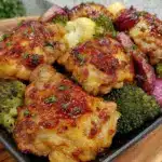 easy crispy sheet pan honey garlic chicken - featured image