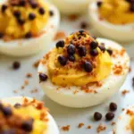 creamy black bean spider deviled eggs - featured image