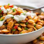 crispy cinnamon sugar baked pumpkin seeds - featured image